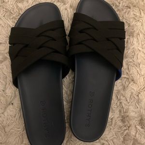 Rothy’s black multi cross strap slide
